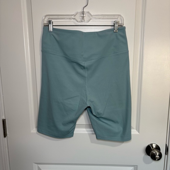 Girlfriend Collective Ribbed Biker Teal Shorts - Picture 2 of 3
